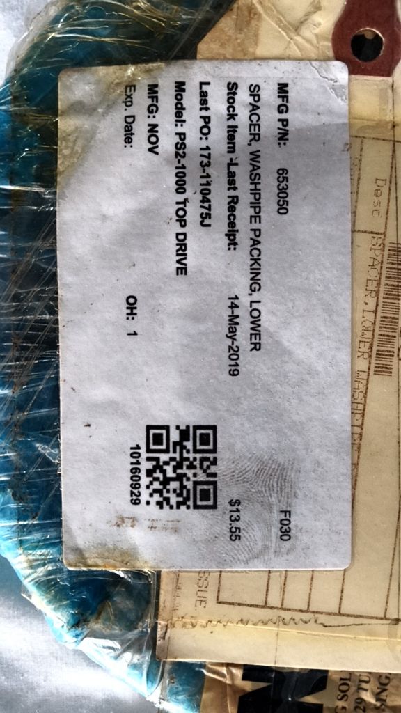 SPACER, WASHPIPE PACKING, LOWER